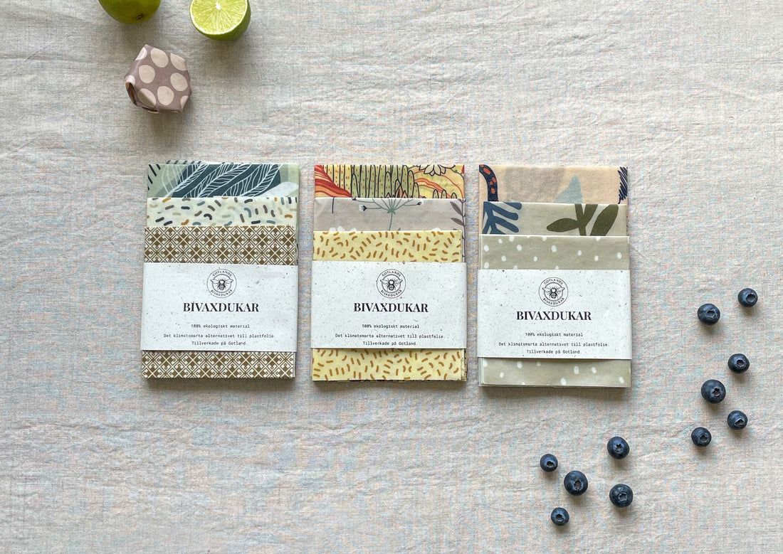 Tre bivaxdukar som ligger uppradade