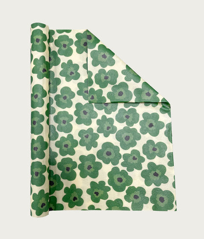 Bivaxrulle Ekeby med gröna blommor